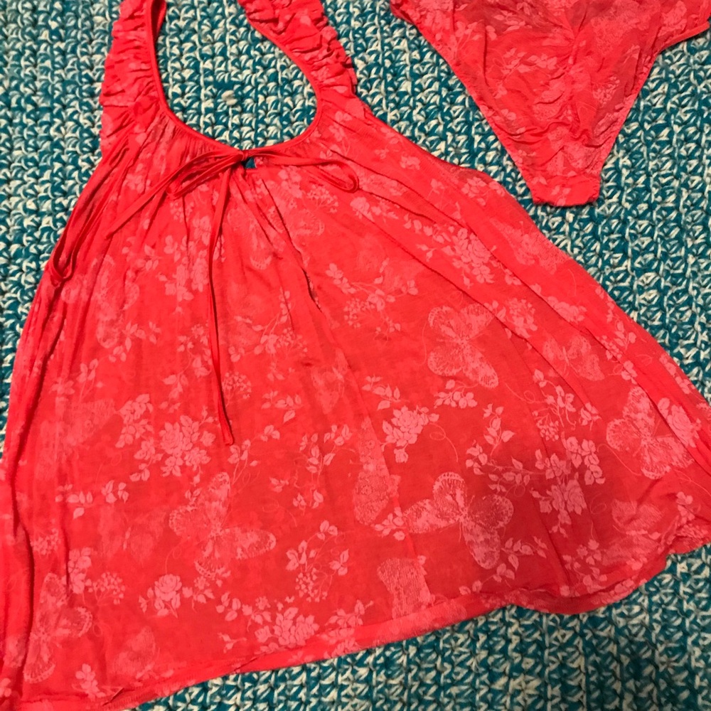 Butterflies and roses nightie, soft, silky, and semi-shear. Rose and pink color.
